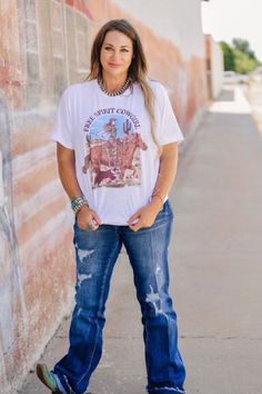 Free spirit cowgirl graphic on white tee Country Style White Top With Graphic Print, Trendy White Tops For Ranch, White Western Tops With Graphic Print, White Western Top With Graphic Print, Western White Top With Graphic Print, White Letter Print T-shirt For Ranch, Graphic Tee Cowgirl Outfit, White Graphic Tee For Rodeo, Country Style White Graphic T-shirt