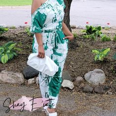 Short Sleeve Jumpsuit, Wear It Off One Or Both Shoulders, Cool Green Print, Side Pockets. Elastic Tie Waist, Runs Slightly Big, Fits True To Size For Most. 90% Polyester, 10% Spandex. Model Is Wearing A Small. (S) 4 - 6 (M) 8 - 10 (L) 12