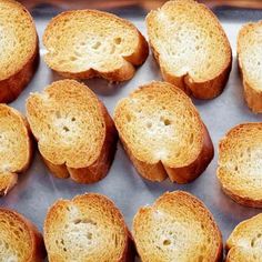 several pieces of bread sitting on top of a pan