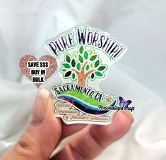 someone is holding up a sticker that says pure worship