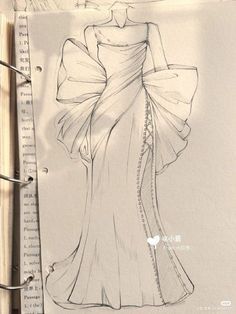 a drawing of a woman's dress on a piece of paper