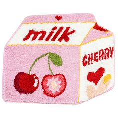 a pink milk carton with cherries on it