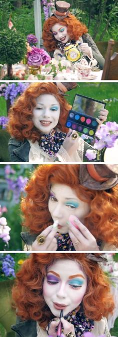 a woman with red hair and makeup is sitting at a table in front of flowers