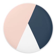 a plate with two different colors on the front and back, one is blue, pink, and white