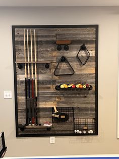 a wall mounted display with various items on it