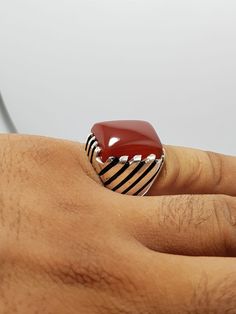 Natural Brown Red Yemeni Aqeeq Ring, Mens Ring, Carnelian Rings, Silver Ring, Sia Rings, Men Silver Jewelry Beautiful Handmade Ring Design 925 Sterling Silver. 925 stamp is mentioned inside the ring We Happily Provide our Customers '100% Natural Gemstones, 925 Sterling Silver and Magnificent Ring Designs'.We always provide BEST quality material. So Don't miss and Choose the Best. WHY US? * 100% Natural Stones * 925k Sterling Silver * Your satisfaction is very important to us * We are giving you Red Rectangular Rings With Polished Finish, Rectangular Red Rings With Polished Finish, Red Rectangular Ring With Polished Finish, Traditional Red Carnelian Ring, Rectangular Red Signet Ring For Gift, Red Rectangular Signet Ring For Gift, Rings Men Silver, Men Silver Jewelry, Aqeeq Ring