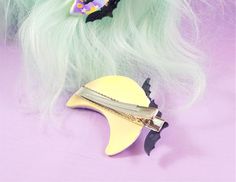 A pastel sherbet rainbow drips lavender or black icing and is decorated with sprinkles, faux whipped cream and adorable bats for a sweet and spooky hair clip perfect for your next pastel goth or yamikawaii outfit. Hair clip is 3.5 inches long and 2.5 inches wide. Choose between a lavender or black drip and left or right facing moon Version 2 come with only one bat For international Shipping Quotes please send a message and a private listing will be created DO NOT CHECK OUT BEFORE YOUR PRIVATE LI Cute Halloween Hair Accessories For Party, Cute Halloween Party Hair Accessories, Yamikawaii Outfit, Decora Hair, Spooky Hair, Black Icing, Faux Whipped Cream, Sweet And Spooky, Kawaii Hair Clips