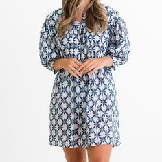 Our Starburst Flower Navy Split Neck Shift Dress is perfect for any occasion. This lightweight cotton dress features a flirty starburst print and gathered puff sleeves. With its versatile style and effortless elegance, you'll be ready to go from day to night. Cotton Dress With Gathered Sleeves For Day Out, Cotton Puff Sleeve Dress For Vacation, Cotton Puff Sleeve Vacation Dress, Cotton Day Out Dress With Gathered Sleeves, Cotton Mini Dress With Gathered Sleeves For Daywear, Cotton Mini Dress With Gathered Sleeves For Day Out, Cotton Mini Dress With Balloon Sleeves, Printed Short Sleeve Loungewear Dress, Casual Spring Dress With Star Print