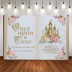 an open book with the words once upon a time and happily happily written on it