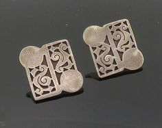 "VGV MEXICO 925 Silver - Vintage Dark Tone Cutout Design Drop Earrings - EG9982  VGV MEXICO 925 Silver - Vintage Dark Tone Cutout Design Drop Earrings - EG9982  Jewelry Type:         Earrings   Metal Type:            925 Silver   Metal Size:             1\"  Stone Type:            N/A  Condition:              N/A  Jewelry Weight:     13.3 Grams  PLEASE NOTE: THIS ITEM IS PRE-OWNED. ALTHOUGH MOST ITEMS ARE IN VERY GOOD CONDITION, SOME MAY NEED CLEANING AND/OR MINOR REPAIRS. WE MAKE A VERY STRONG EFFORT TO UPLOAD CLEAR PICTURES. PLEASE INSPECT ALL PICTURES AND ASK ALL QUESTIONS YOU MAY HAVE PRIOR TO MAKING A PURCHASE. NOT ALL STONES ARE GENUINE, SOME ARE ENHANCED OR CREATED." Clear Pictures, Cutout Design, Earrings Metal, Beautiful Rings, Types Of Metal, Statement Pieces, Metallic Silver, Etsy Gifts, 925 Silver