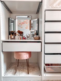 an organized closet with drawers, stools and other items in it's storage area