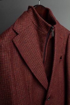 A handmade bespoke coat cut from a heavy-duty English tweed coating fabric with a unique texture created by a melange of yarns. This fabric is warm, rugged and built to last the test of time. It can be dressed-up or dressed-down and is designed to get better with age as it breaks-in and develops character - over years, if not decades. Tailored Long Tweed Jacket, Brown Tweed Wool Long Coat, Brown Tweed Long Wool Coat, Business Tweed Outerwear With Concealed Placket, Winter Wool Tweed Jacket With Concealed Placket, Luxury Winter Tweed Dress, Luxury Tweed Dress For Winter, Fall Tweed Wool Coat For Tailoring, Long Tweed Jacket For Fall