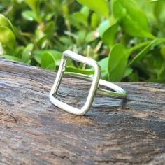 This Open Square Karma Silver Minimalist Ring has a Dainty Thin look and is for everyday wear.  This is a trendy and stylish design, with comfortable fit. Material: 925 Sterling Silver Open Square: about 14mm by 14mm, 1.6mm thick, very light hammered plain surface or Twisted Rope Pattern.  It is slightly curved, according to the shape of the ring band. Ring Band Thickness:  about 1.6mm in diameter, very light hammered plain surface. ** For Size 10 and up: Measurement of material will be 2mm in d Rope Pattern, Square Photos, Minimalist Ring, Square Pattern, Minimalist Rings, Ring Band, Ring Sterling Silver, Sterling Ring, Rings Statement