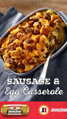 sausage and egg casserole recipe in a blue dish with spoon on the side