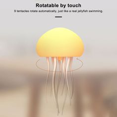 an image of a jellyfish floating in the ocean with caption that reads, rotatable by touch