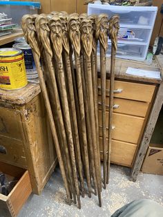 a bunch of wooden sticks sitting on top of a table