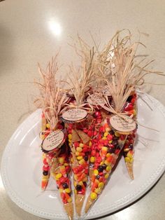 a plate with candy corn on top of it