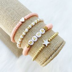 Star & Heart Bracelets by Sarahndipity Jewelry Beaded, Stretch, Stackable, Pink Heart Bead, White Star Bead, Beaded Bracelet, Gold Bead - Etsy Trendy White Stretch Bracelet For Mother's Day, Pink Stretch Bracelet With Tiny Beads For Everyday, Dainty Pink Stackable Beaded Bracelets, Trendy Stretch Bracelet With Spacer Beads As Gift, Dainty Adjustable Stretch Bracelet With Heart Beads, Trendy Gold Stretch Bracelet With Heart Beads, Pink Stretch Bracelet With Heart Beads For Everyday, Dainty White Stretch Bracelet With Spacer Beads, Trendy White Stretch Bracelet With Heart Beads