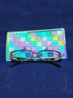 Handmade Plastic Canvas Eyeglass Case, these little beauties will save your favorite glasses from the inevitable scratch monsters in your purse, backpack or bag! Plastic Canvas Phone Case, Glasses Case Pattern Plastic Canvas, Plastic Canvas Eyeglass Case, Plastic Canvas Eye Glass Case, Checkbook Covers Plastic Canvas, Needlepoint Eyeglass Case, Glasses Cases, Purse Backpack, Eyeglass Case