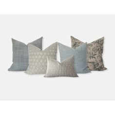 six pillows in different colors and patterns