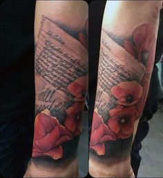 the arm is decorated with red flowers and an old book