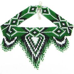 a green and white beaded necklace