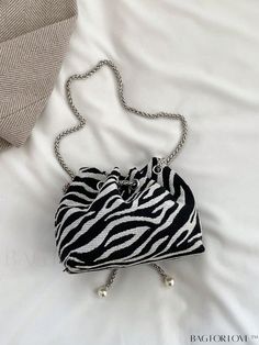 BagForLove - Sleek Drawstring Bucket Bag with Zebra Print and Pearl Accents Product Description Color Black and White Type Bucket Bag Bag Size Small Composition 100% Polyamide Material Polyamide Size Chart INCH CM Strap Length Bag Length Bag Width Bag Height 44.9 inch 9.4 inch 3.5 inch 5.5 inch Strap Length Bag Length Bag Width Bag Height 114 cm 24 cm 9 cm 14 cm Details Pictures Similar Products h2 { text-align: center; } /* æ¢è¡ */ li{ white-space: normal; word-break: break-all; word-wrap: br Black Zebra Print Bags For Daily Use, Black Zebra Print Bag For Daily Use, Chic Black Bag With Zebra Print, Chic Black Bags With Zebra Print, Trendy Black Zebra Print Bags, Chic Black Zebra Print Bag, Drawstring Bucket Bag, Word Wrap, Bag Bag