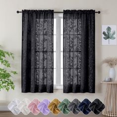 the curtains in this room are black and white, with different color options for each window