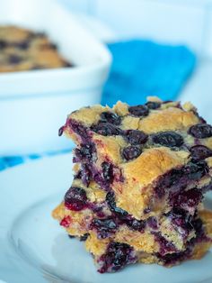 blueberry crumb bars stacked on top of each other