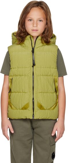 Sleeveless garment-dyed down-filled quilted taffeta vest in yellow. Signature acetate lenses at hood. · Water-resistant · Zip closure · Zip pockets · Full taffeta lining · Machine wash Model measures 53 / 134.5 cm tall and wears a size 8Y. Supplier color: Golden palm C.P. Company Kids Size: child's height 2Y: 36.25 / 92 cm 4Y: 41 / 104 cm 6Y: 45.75 / 116 cm 8Y: 50.5 / 128 cm 10Y: 56 / 142 cm 12Y: 61.5 / 156 cm 14Y: 67 / 170 cm Fill: 90% white duck down, 10% feathers. Childrens Scarf With Pocetß, Knit Kids Vest, Boys Winter Vest, C P Company, White Duck, White Ducks, Down Vest, Duck Down, Off Duty