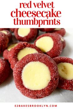 red velvet cheesecake thumbprints on a plate with text overlay that reads, red velvet cheesecake thumb prints