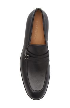 Rich tumbled leather shapes this Italian-crafted loafer punctuated with a gleaming gancino at the layered strap. Leather upper, lining and sole Made in Italy Designer Shoes Luxury Calf Leather Loafers For Semi-formal Occasions, Elegant Slip-on Monk Strap Shoes In Calf Leather, Elegant Calf Leather Monk Strap Shoes, Luxury Semi-formal Loafers With Leather Lining, Elegant Calf Leather Monk Strap Shoes For Semi-formal Occasions, Elegant Calf Leather Monk Strap Shoes For Business Casual, Calf Leather Dress Shoes With Textured Sole For Office, Designer Office Moccasins With Leather Sole, Luxury Leather Lined Loafers For Office