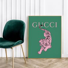 a green chair next to a poster with a pink tiger on it