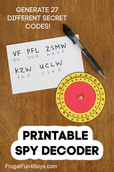 the printable spy decoder is on top of a wooden table with a pen and paper