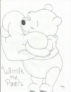 a drawing of a teddy bear hugging someone's arm with the words winnie the pooh on it