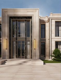 the entrance to a large building with glass doors