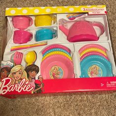 barbie dinnerware set in its box on the floor