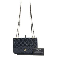 Chanel Wallet on Chain Navy Patent Leather Gold-tone Double Chain, 2015-2016 These are professional photos of the actual bag offered by Luxbags. Perfect for any occasion, the Chanel Wallet on Chain WOC is crafted from patent leather in navy color with gold-tone hardware. It features a timeless, classic design that is sure to stay forever in style. The chain can be extended to to form a crossbody bag or when doubled a shoulder bag. CONDITION: VERY GOOD CONDITION This preloved item is in good condition with light signs of wear throughout, specially around the corners and the edges. Scrapes on the strap and scratches to the hardware. Minor stains on the inside. DETAILS Circa 2015-2016 Series 21 Chanel Wallet on Chain Navy Patent leather Width 19.5cm x Height 13cm x Depth 4cm Chanel Wallet On Chain, Vintage Chanel Bag, Stay Forever, Classic Flap Bag, Professional Photos, Wallet On Chain, Double Chain, Chanel Wallet, Chanel Black