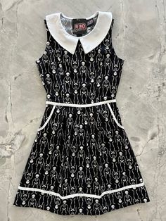 flatlay of skeleton collared dress Halloween Clothing, 60s Style, Collared Dress, Skeleton Print, Retro Clothing, Contrast Piping, Halloween Spooky, 60s Fashion, Halloween Dress