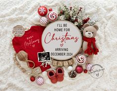 a christmas card surrounded by ornaments and other items on a white blanket with the words, i'll be home for christmas