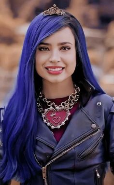 a woman with blue hair wearing a leather jacket