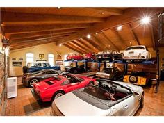 a garage filled with lots of different types of cars