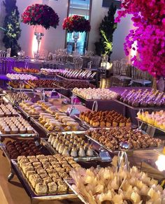 a buffet filled with lots of different types of desserts