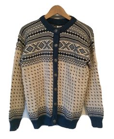 Women’s Vintage Dale Of Norway Wool Cardigan Sweater size M. Clean condition throughout Chest pit to pit 20 Sleeves from center back of neck to cuff 29.5 Length from nape of neck to hem 23.5 Classic Long Sleeve Cardigan With Fair Isle Pattern, Scandinavian Style Long Sleeve Cardigan For Fall, Classic Long Sleeve Fair Isle Cardigan, Vintage Crew Neck Cardigan For Winter, Winter Vintage Crew Neck Cardigan, Dale Of Norway, Nape Of Neck, Wool Cardigan, Cardigan Sweater