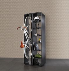 a bike is parked in the corner of a room with a bookcase and shelves