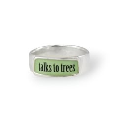 Sterling Silver and Enamel Talks to Trees Band Ring This band ring is unisex and perfect for sending a message! Great for your nature loving friends. Each piece is cast in sterling silver, to which 3 layers of vitreous enamel are applied and fired. Finally, I apply and fire the custom screen prints made from my drawings. Adorable, durable, and unique! Band width goes from 1/8" up to 1/4" depending on the size. Available in whole sizes 5-11. Each item comes in a cute box ready for gift giving, wi Talk To Trees Ring, Talk To Trees, Funky Rings, Vitreous Enamel, Custom Screen Printing, Loving Friends, Tree Rings, Cute Box, Funky Jewelry