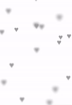 hearts are flying in the air on a white background with gray and black dots around them