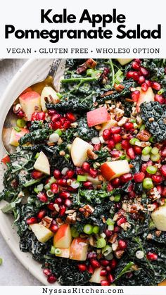 kale apple pomegranate salad on a white plate with text overlay