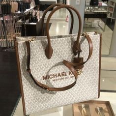 Michael Kors Mirella Large Tote Shoulder Bag Mk Signature Pvc Leather Vanilla 100% Authentic Gold Toned Hardware Custom Fabric Lining 1 Zipper Pocket 2 Slip In Pockets 15.75" W X 14" H X 7.75" D Handle Drop: 5.25" Adjustable Strap: 20.5" - 24.5" Very Clean, Smoke And Pet Free Environment Cream Shopping Bag With Logo, Cream Bags With Logo For Shopping, Cream Shoulder Bag With Logo For Shopping, White Logo Satchel Bag, White Large Capacity Shoulder Bag In Coated Canvas, White Logo Shoulder Bag For Errands, White Michael Kors Shoulder Bag With Logo, Trendy White Michael Kors Bag, White Shoulder Bag With Branded Hardware For On-the-go