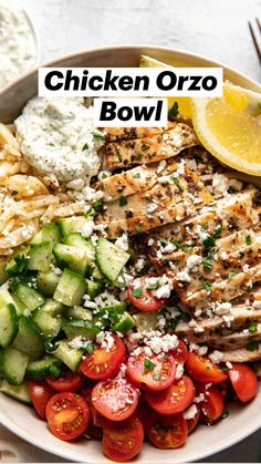 a white bowl filled with chicken, cucumber, tomatoes and feta cheese